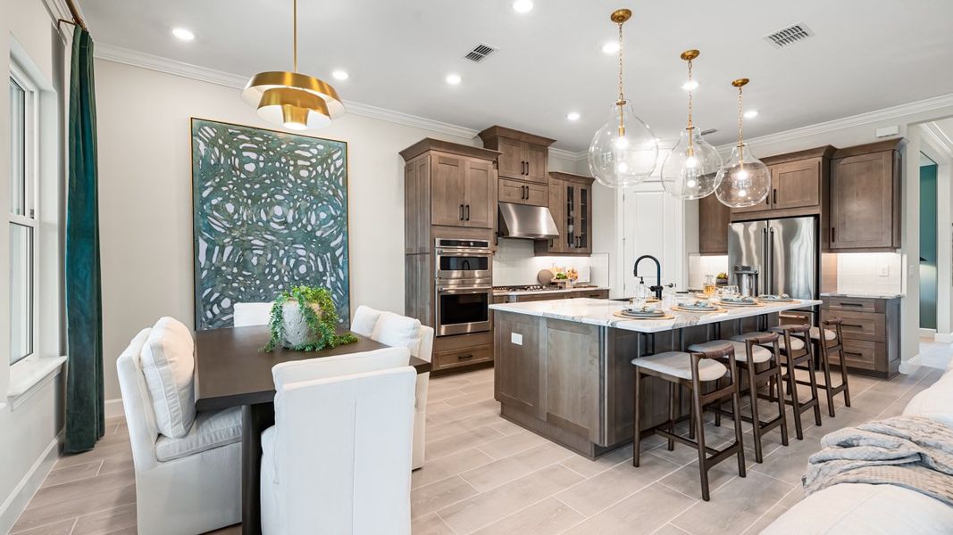 Representative furnished interior of a home built from the Marino by Taylor Morrison in Esplanade at Cammaray Lakewood Ranch, Sarasota (Image 8). Representative furnished interior of a home built from the Marino by Taylor Morrison in Esplanade at Cammaray Lakewood Ranch, Sarasota (Image 8).