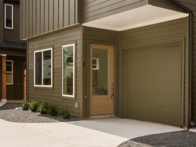 Contemporary exterior featuring horizontal siding and vertical paneling