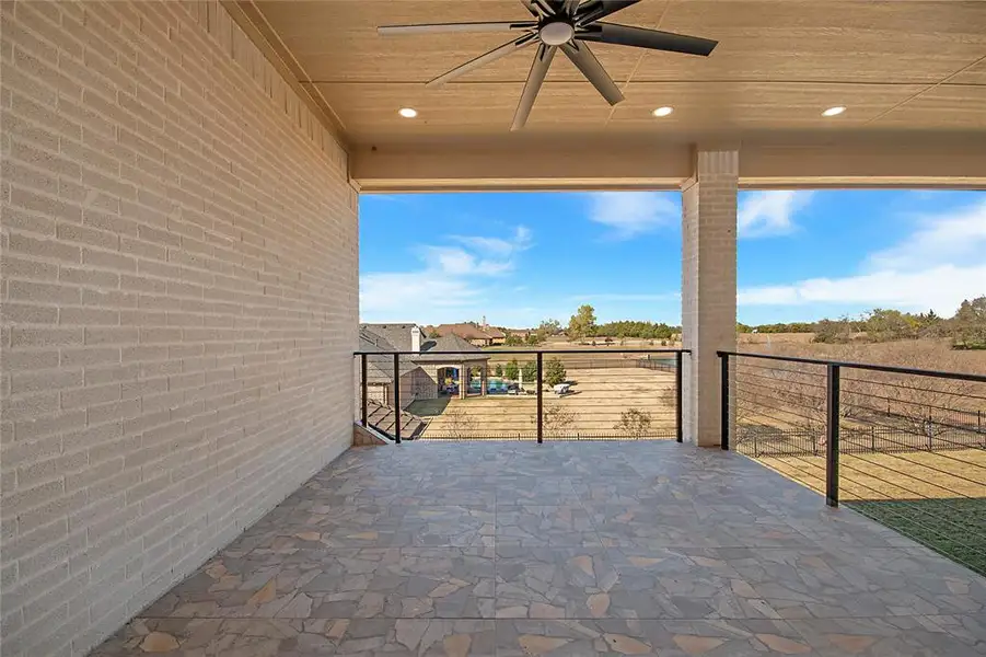 View of patio / terrace featuring a ceiling fan View of patio / terrace featuring a ceiling fan