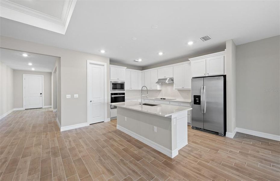 Furnished interior view inside a new home in The Strand at Cedar Grove, North Port (Image 7).