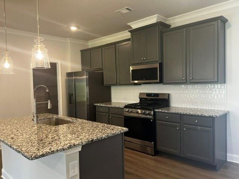 Furnished interior view inside a new home in Crofton Place Enclave, Snellville (Image 11). Furnished interior view inside a new home in Crofton Place Enclave, Snellville (Image 11).
