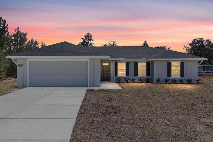 Front exterior of a new home in , Ocala, FL, highlighting curb appeal (Image 2).