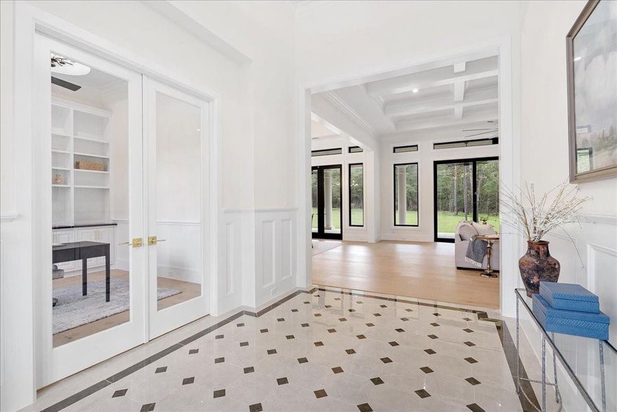 Individually hand cut and laid entry tile in the entry is just the beginning of the handcrafted amenities that await.