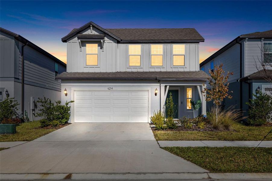 Front exterior of a new home in Waterset, Apollo Beach, FL, highlighting curb appeal (Image 23).