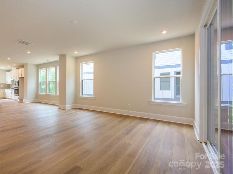 Connected living spaces and 9' ceilings to open up the home to natural flow.