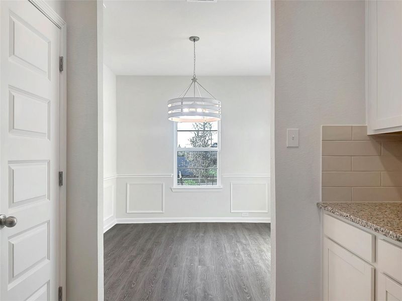The Caldwell- Dining Room and Butler's Pantry. Home is under construction. Sample image for illustration; upgrades, options, and colors may vary.