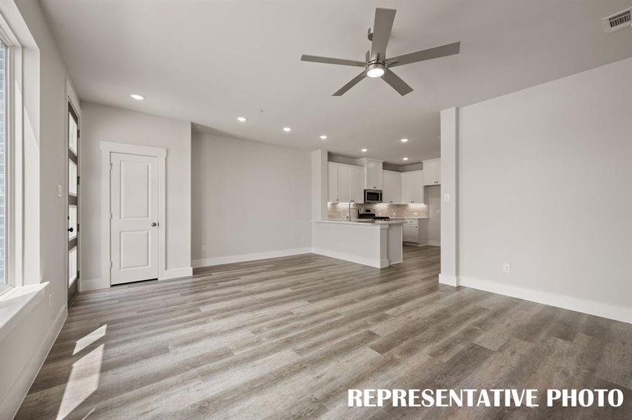 Our Bella floor plan offers an open and flowing space perfect for entertaining.  REPRESENTATIVE PHOTO