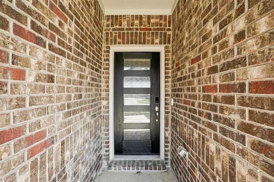Exterior details and patio area of a home in Lakehaven - Premier Series, Farmersville (Image 23). Exterior details and patio area of a home in Lakehaven - Premier Series, Farmersville (Image 23).