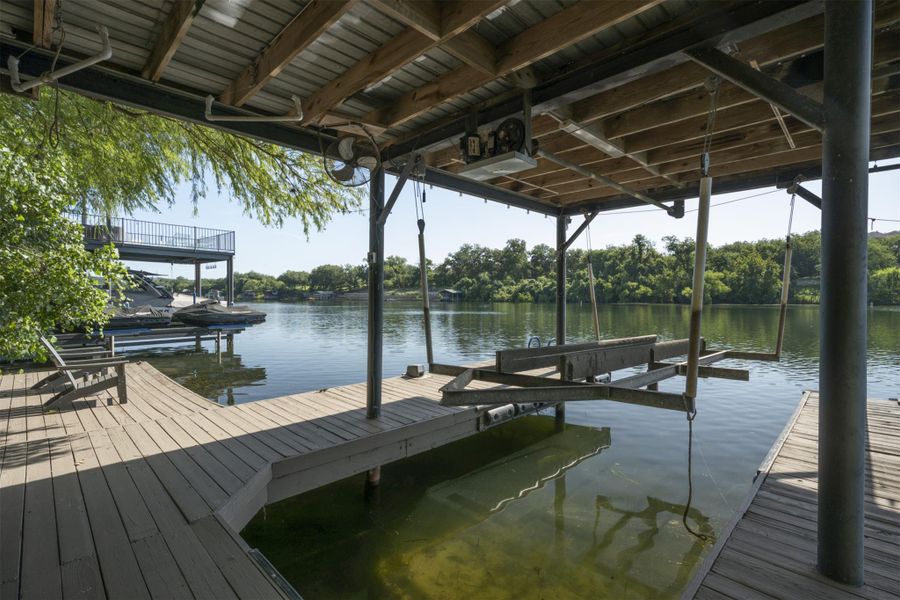 Dock with a water view and boat lift Dock with a water view and boat lift