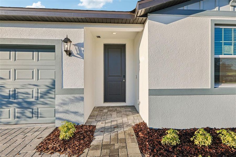 Exterior details and patio area of a home in Wynnstone - Signature Series, Davenport (Image 3).