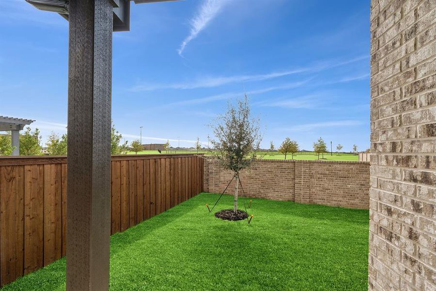 Exterior details and patio area of a home in South Pointe Cottage Series, Mansfield (Image 2). Exterior details and patio area of a home in South Pointe Cottage Series, Mansfield (Image 2).
