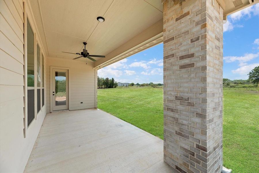 View of patio with ceiling fan