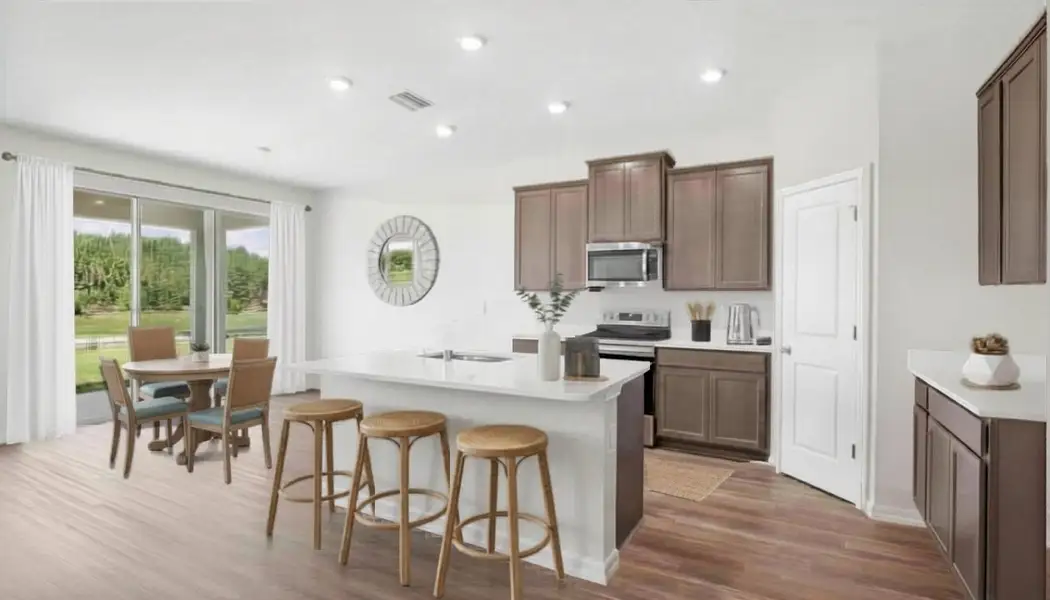 Representative furnished interior of a home built from the Coral by D.R. Horton in Deerbrook, Land O' Lakes (Image 3).