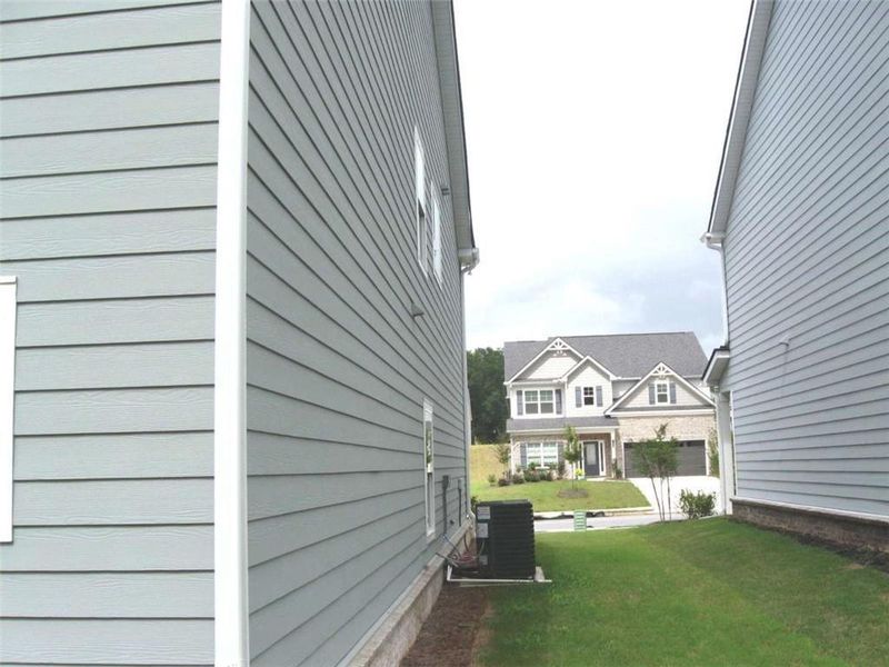 Exterior details and patio area of a home in Neely Farm, Covington (Image 3). Exterior details and patio area of a home in Neely Farm, Covington (Image 3).