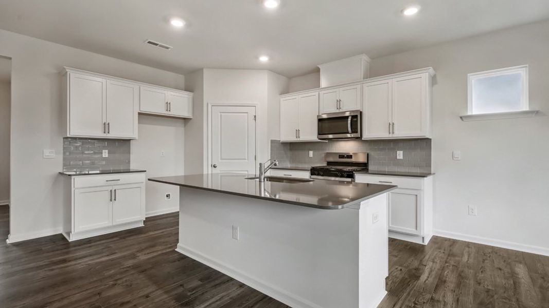 Furnished interior view inside a new home in Ridgewood Farms, Winterville (Image 10). Furnished interior view inside a new home in Ridgewood Farms, Winterville (Image 10).
