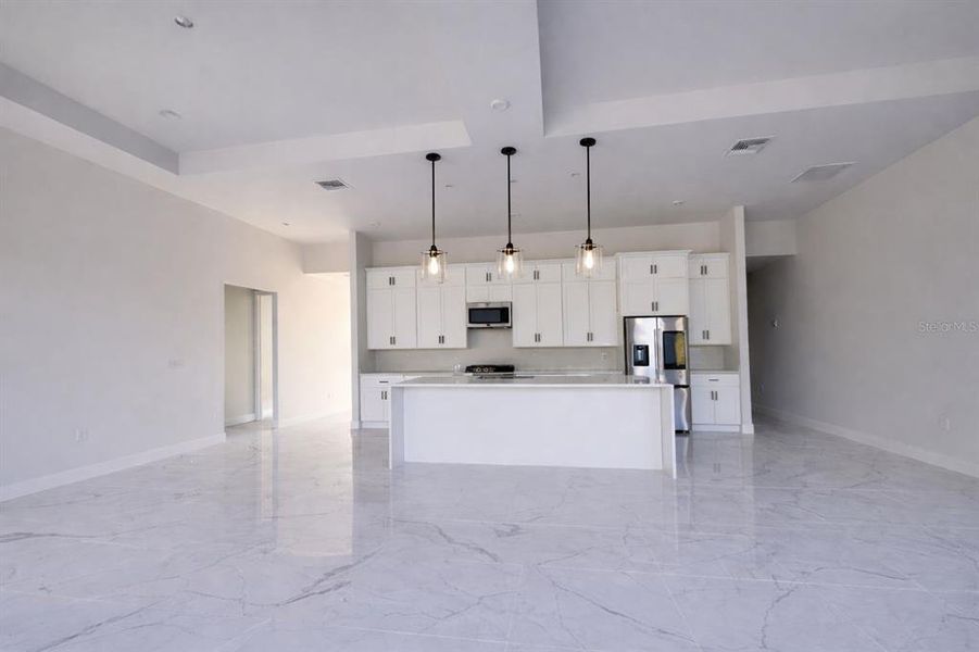 Spacious, unfurnished interior of a new home in , Port Charlotte (Image 11).