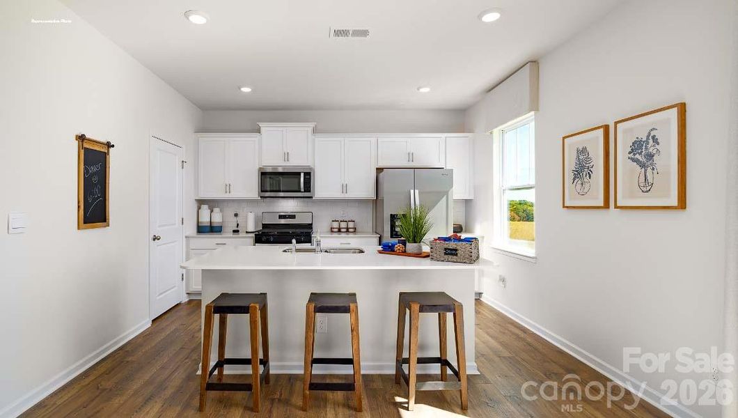 Furnished interior view inside a new home in Calvin Creek, Troutman (Image 4).