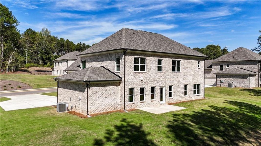 Front exterior of a new home in , Ellenwood, GA, highlighting curb appeal (Image 25).