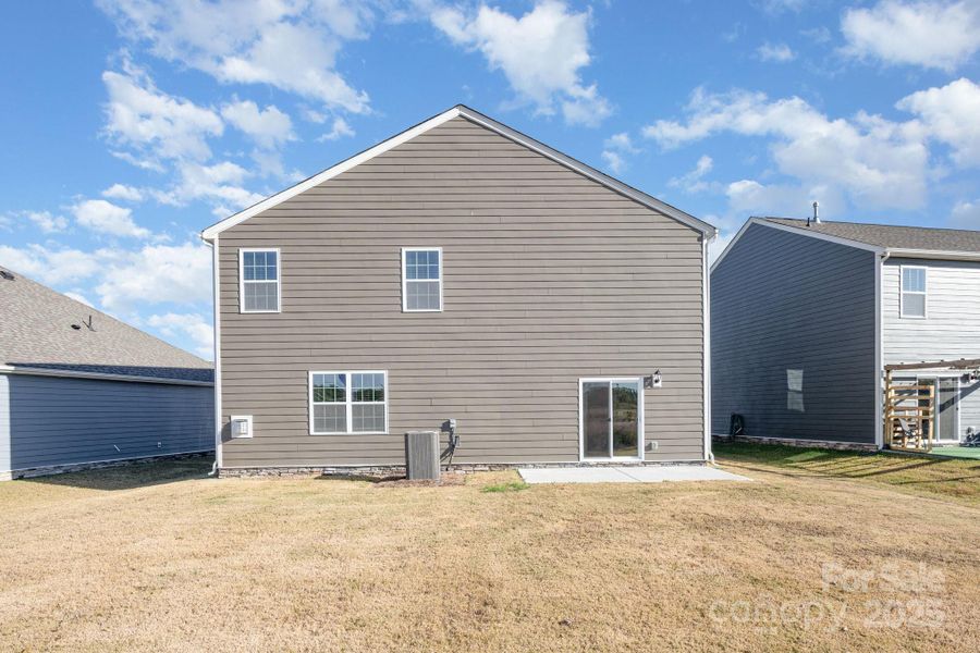 Exterior details and patio area of a home in Secrest Commons, Monroe (Image 2). Exterior details and patio area of a home in Secrest Commons, Monroe (Image 2).