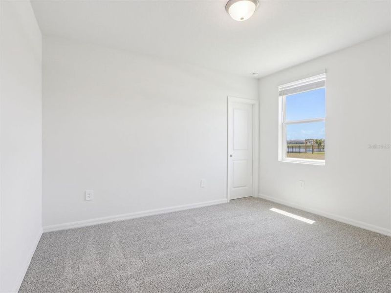 Spacious, unfurnished interior of a new home in The Reserve at Van Oaks, Auburndale (Image 17).