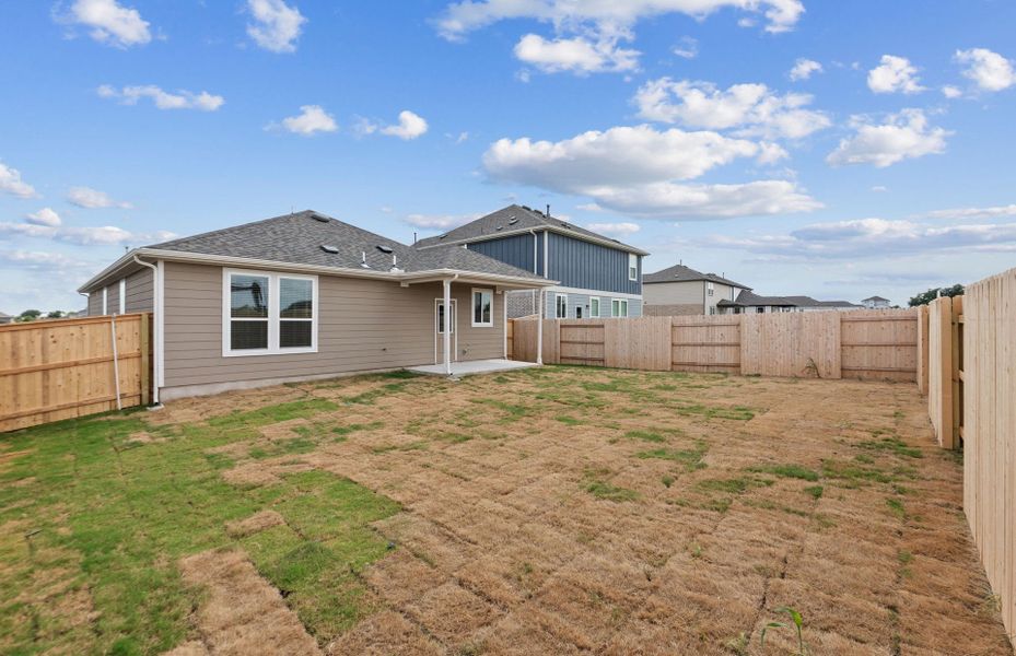 Exterior details and patio area of a home in Patterson Ranch, Georgetown (Image 25).