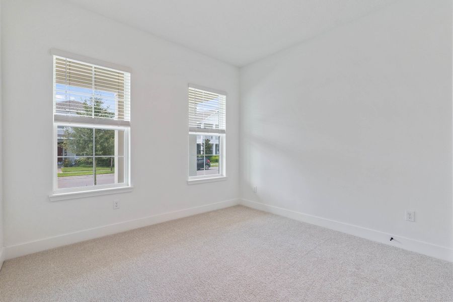 Representative unfurnished interior of a home built from the Hemingway by Rockwell Homes in Northlake At Ovation, Winter Garden (Image 19).