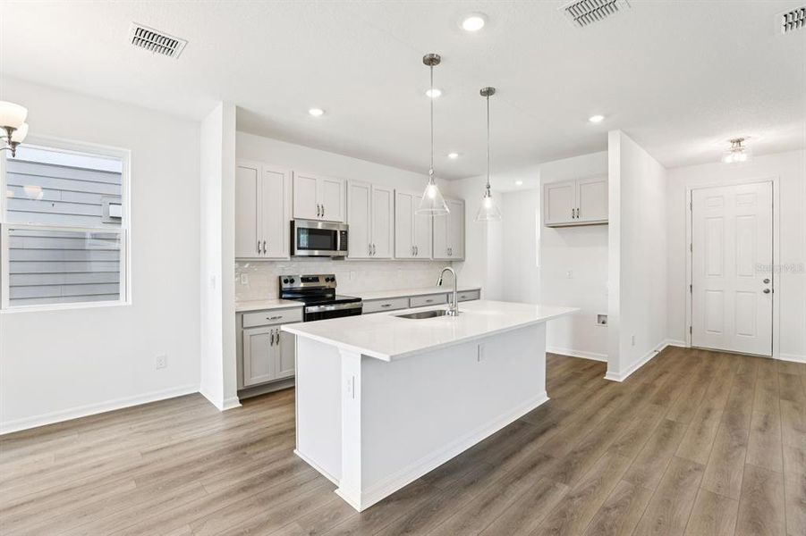 Furnished interior view inside a new home in Ellington Classical, St. Cloud (Image 3). Furnished interior view inside a new home in Ellington Classical, St. Cloud (Image 3).