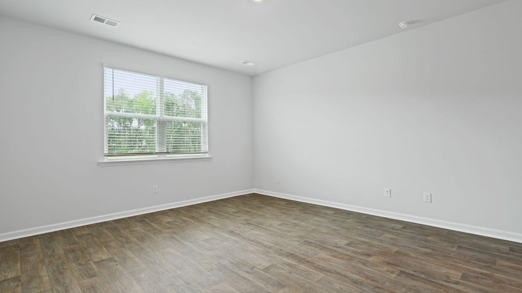 Spacious, unfurnished interior of a new home in Pine Hills at Cane Bay, Summerville (Image 9). Spacious, unfurnished interior of a new home in Pine Hills at Cane Bay, Summerville (Image 9).