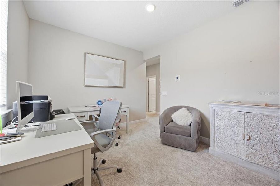 Furnished interior view inside a new home in Highland Ridge, Winter Garden (Image 19).