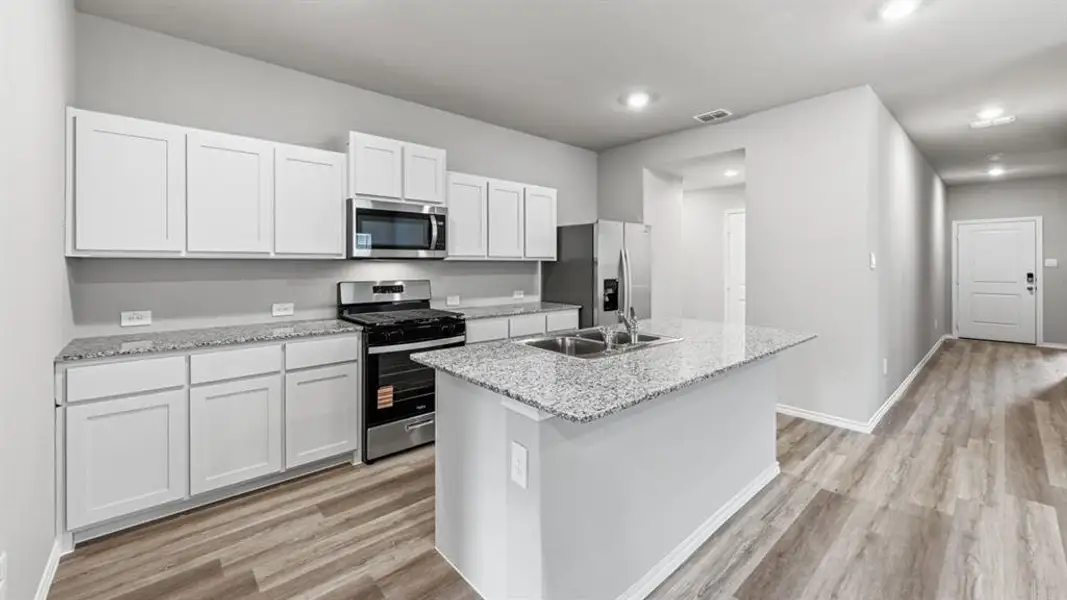 Kitchen - All Home and community information, including pricing, included features, terms, availability and amenities, are subject to change at any time without notice or obligation. All Drawings, pictures, photographs, video, square footages, floor plans, elevations, features, colors and sizes are approximate for illustration purposes only and will vary from the homes as built.