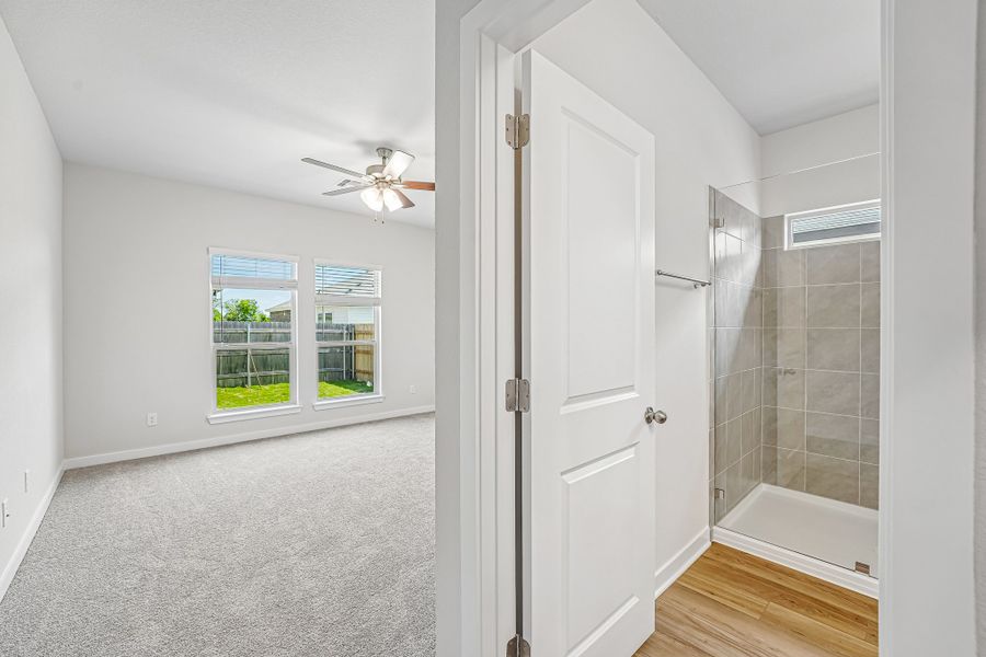 Representative unfurnished interior of a home built from the Warrior by Omega Builders in Grove East, Temple (Image 11).
