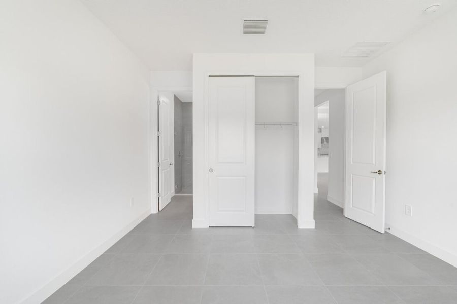 Representative unfurnished interior of a home built from the Saint Clair by Taylor Morrison in Harvest at Ovation, Winter Garden (Image 39).