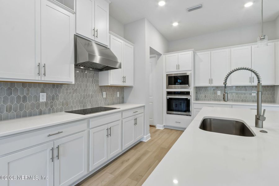 Furnished interior view inside a new home in Sandy Ridge, Yulee (Image 6).