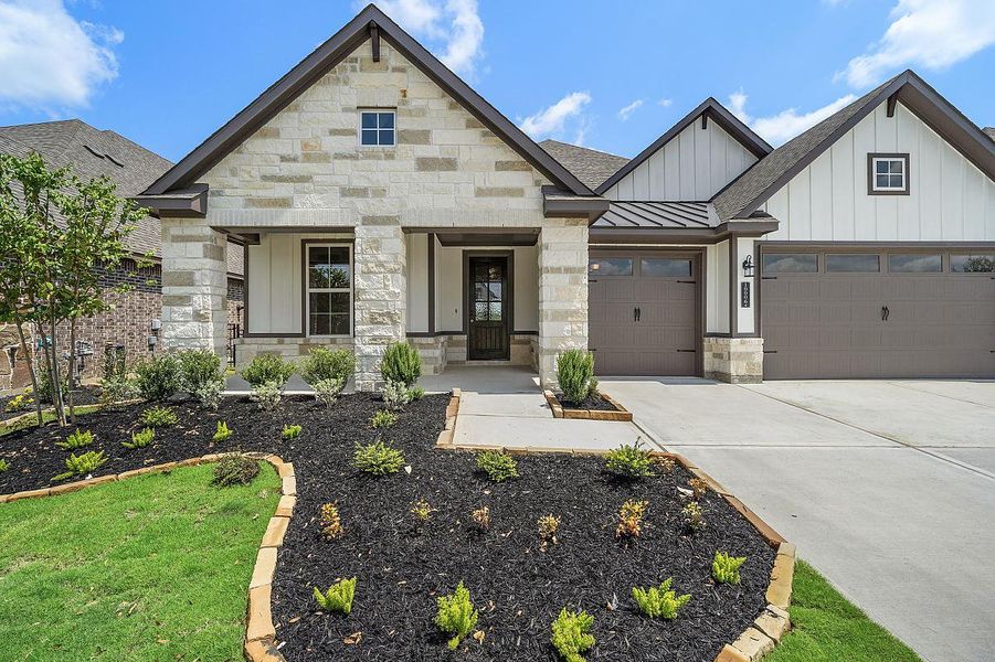 Representative exterior photo of a completed home built from the Daisy by Caldwell Homes in The Highlands, Porter, TX (Image 25). Representative exterior photo of a completed home built from the Daisy by Caldwell Homes in The Highlands, Porter, TX (Image 25).