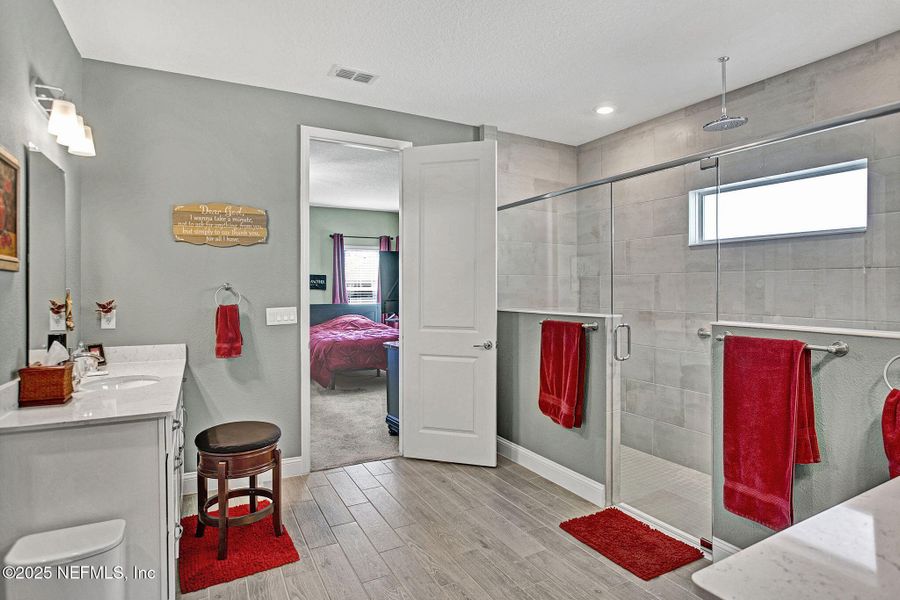 Furnished interior view inside a new home in Tributary: Lakeview at Tributary 60's, Yulee (Image 15).