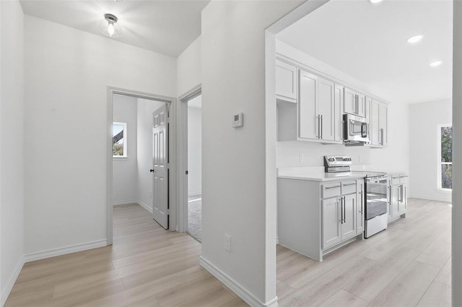 Furnished interior view inside a new home in , Whitney (Image 8). Furnished interior view inside a new home in , Whitney (Image 8).