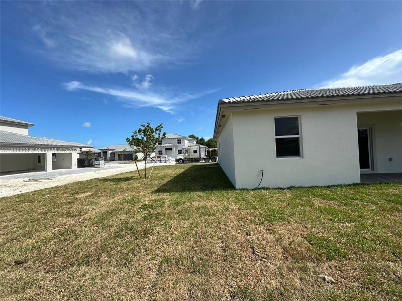 Exterior details and patio area of a home in Hawthorne at Galiano Pointe, Miami (Image 3).