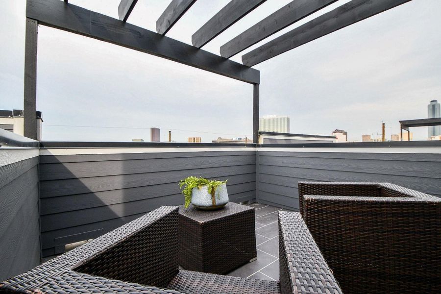 Exterior details and patio area of a home in , Houston (Image 3). Exterior details and patio area of a home in , Houston (Image 3).