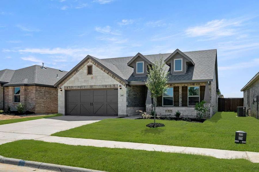 Front exterior of a new home in Baker Farms, Cleburne, TX, highlighting curb appeal (Image 13). Front exterior of a new home in Baker Farms, Cleburne, TX, highlighting curb appeal (Image 13).