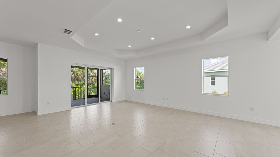 Spacious, unfurnished interior of a new home in Verandah Real Estate and Homes for Sale in Fort Myers, FL - Neal Communities, Fort Myers (Image 23).