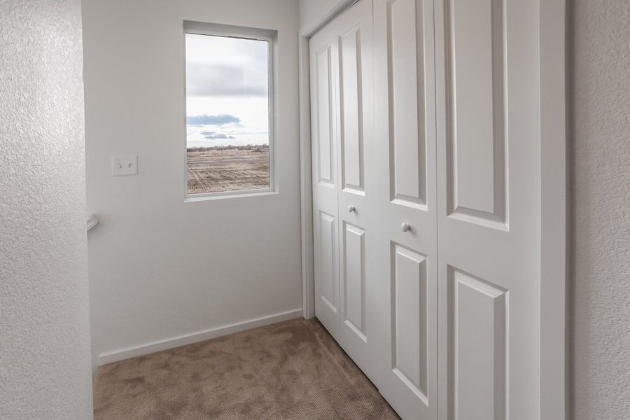 Representative unfurnished interior of a home built from the Sage by Hartford Homes in Bloom, Fort Collins (Image 42).