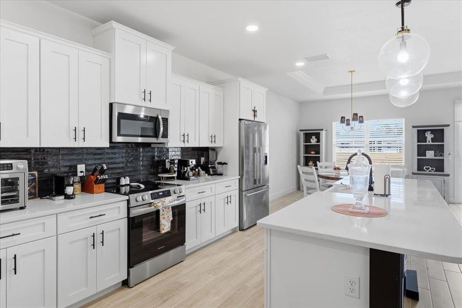 Furnished interior view inside a new home in Grand Oaks, Gainesville (Image 12).