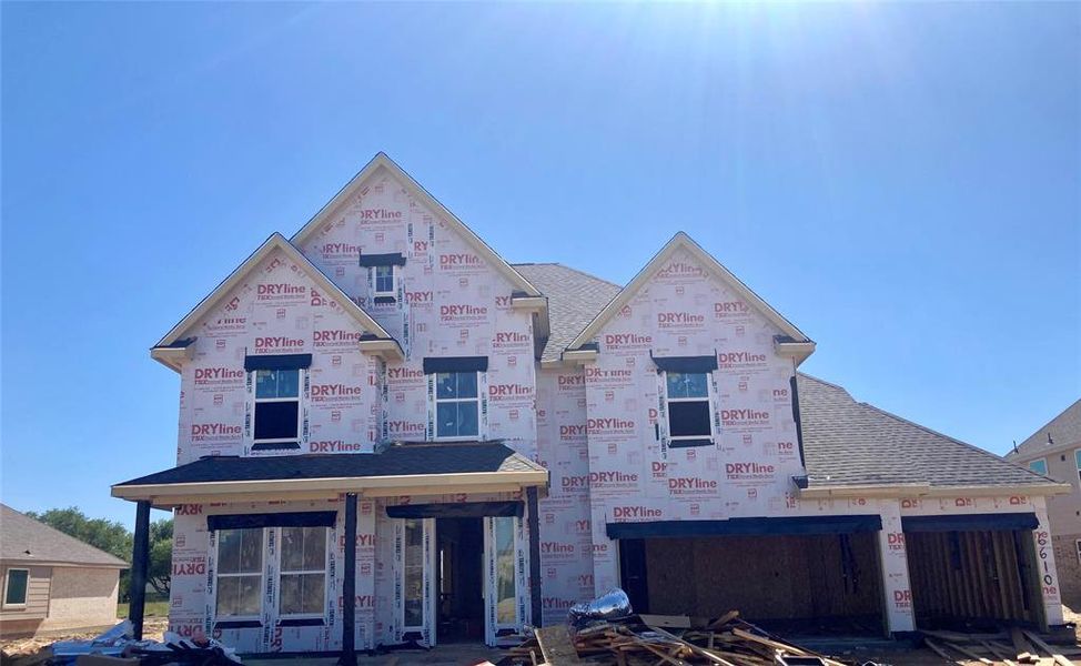 Two-story home with 5 bedrooms, 3.5 baths and 3 car attached garage