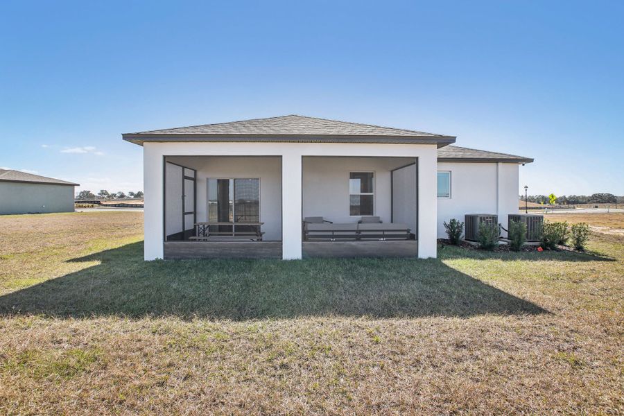 Exterior details and patio area of a home in Silver Springs Shores, Ocala (Image 21).