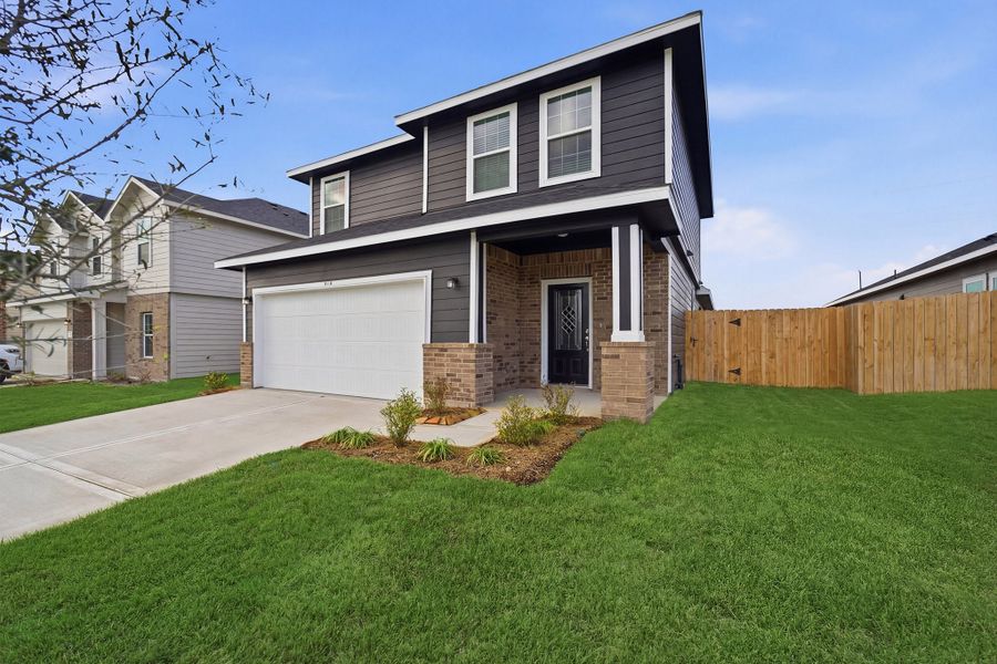 Front exterior of a new home in The Reserve at Huntsville, Huntsville, TX, highlighting curb appeal (Image 24). Front exterior of a new home in The Reserve at Huntsville, Huntsville, TX, highlighting curb appeal (Image 24).