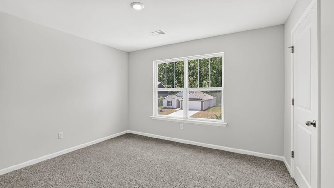 Spacious, unfurnished interior of a new home in Bentley Park, Greenwood (Image 25). Spacious, unfurnished interior of a new home in Bentley Park, Greenwood (Image 25).