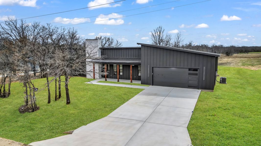 Representative exterior photo of a completed home built from the Zephyer 2 by Zeal Home Builders in Parallel Pastures, Poolville, TX (Image 25).