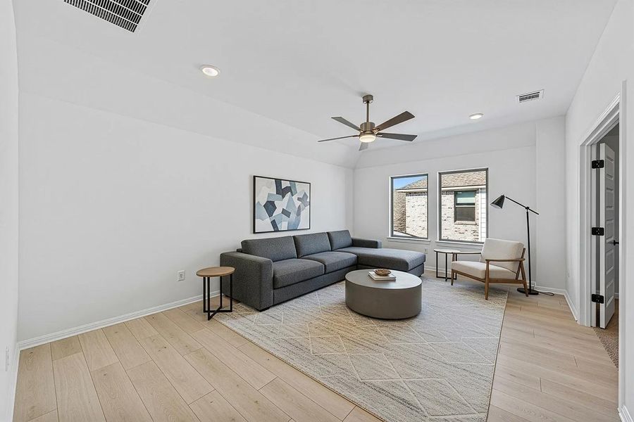 Furnished interior view inside a new home in Parmer Ranch 60, Georgetown (Image 6).