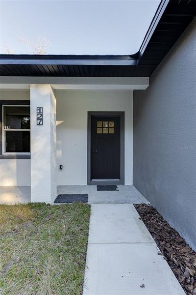 Exterior details and patio area of a home in , Deltona (Image 22).