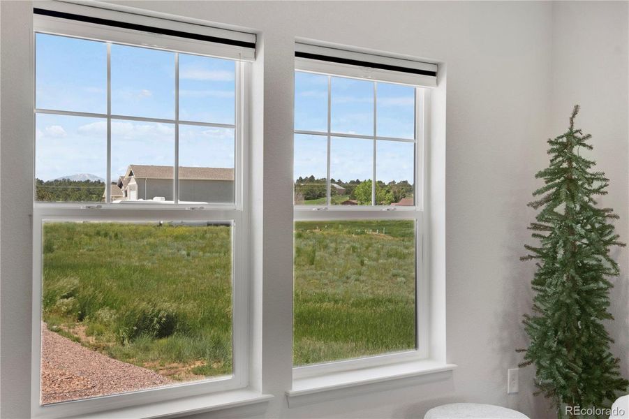 Living room with recessed lighting, ornamental molding, a ceiling fan, open concept